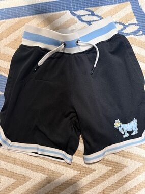 Kids Black Shorts with Light Blue Trim and Playful Goat Patch